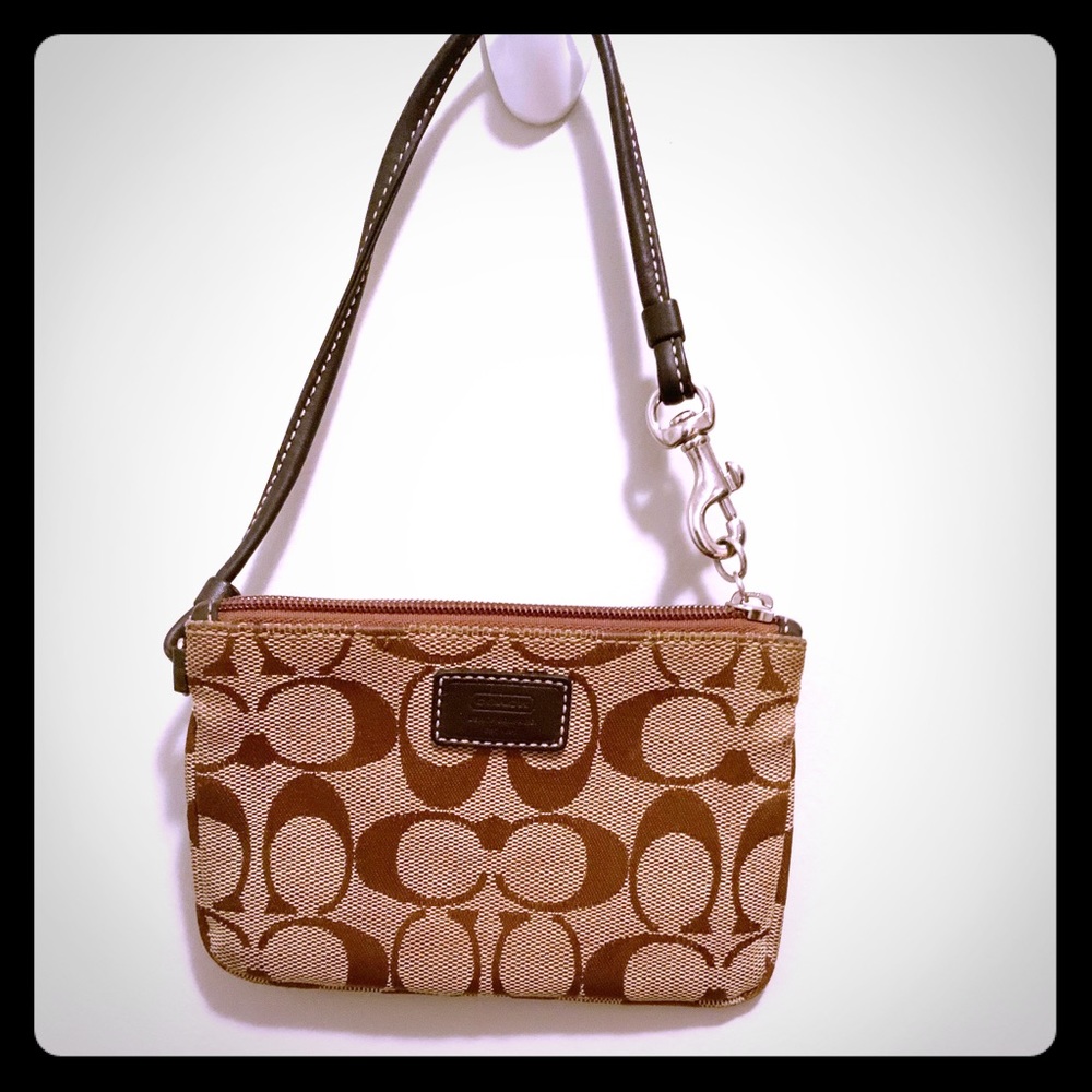 - Coach  Signature Wristlet